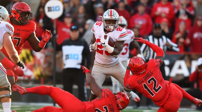 Ohio State running back Mike Weber carries the ball against Maryland.