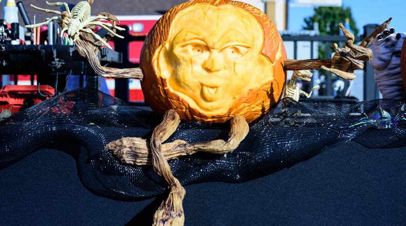 Friday the 13th was celebrated at Main Street Commons in downtown Fairborn on Oct. 13, 2023. The event featured food trucks, a beer garden, live music from Cleveland’s Alt95 and a pumpkin carving demonstration by Chad Hartson of Ice Creations. Did we spot you there? TOM GILLIAM/CONTRIBUTING PHOTOGRAPHER