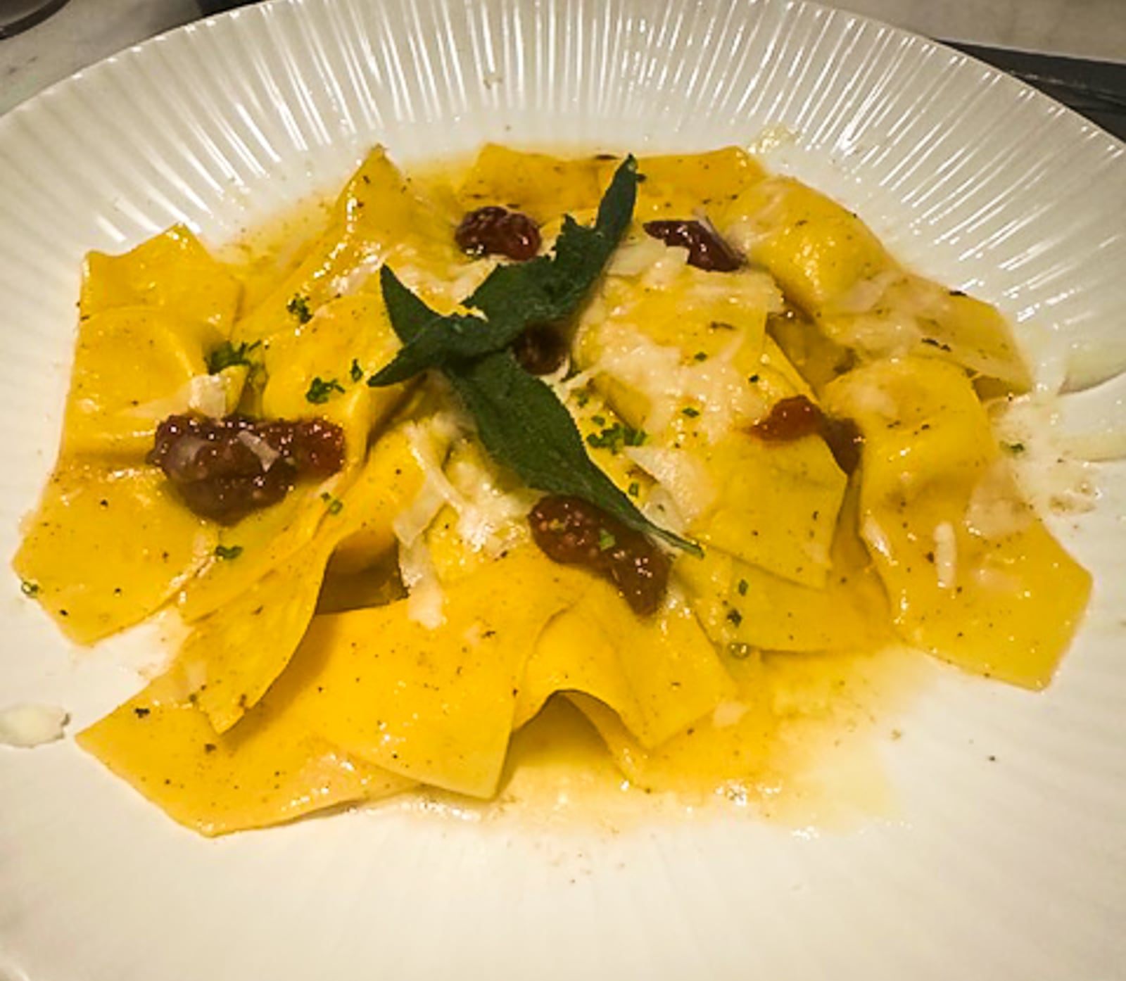 Tortelli di Zucca, butternut squash-filled pasta with brown butter, crispy sage, and apple mostarda at Grist restaurant in Dayton. CONTRIBUTED/RAY MARCANO