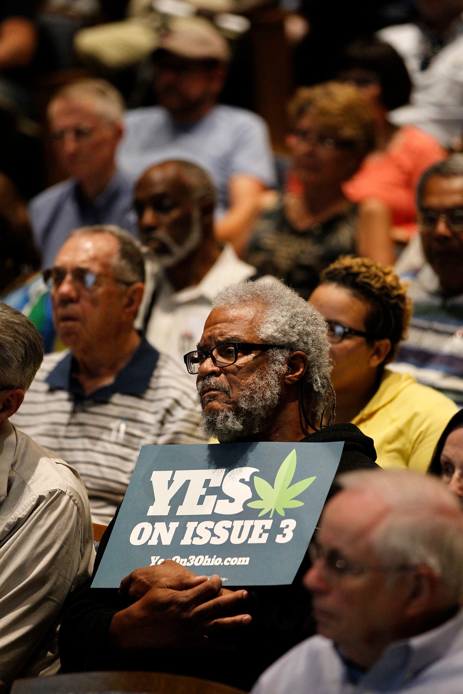 Over 300 people, including Michael Wolfe of Dayton, attended a forum to discuss marijuana issues Wednesday evening at Sinclair Community College. The event, Marijuana: Dayton Decides was sponsored by Cox Media Group Ohio and the League of Women Voters of the Greater Dayton area. LISA POWELL / STAFF