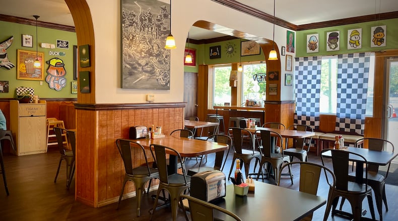 The Ugly Duckling has reopened in a new location at 1430 E. Fifth St. in Dayton’s St. Anne’s Hill Historic District. NATALIE JONES/STAFF