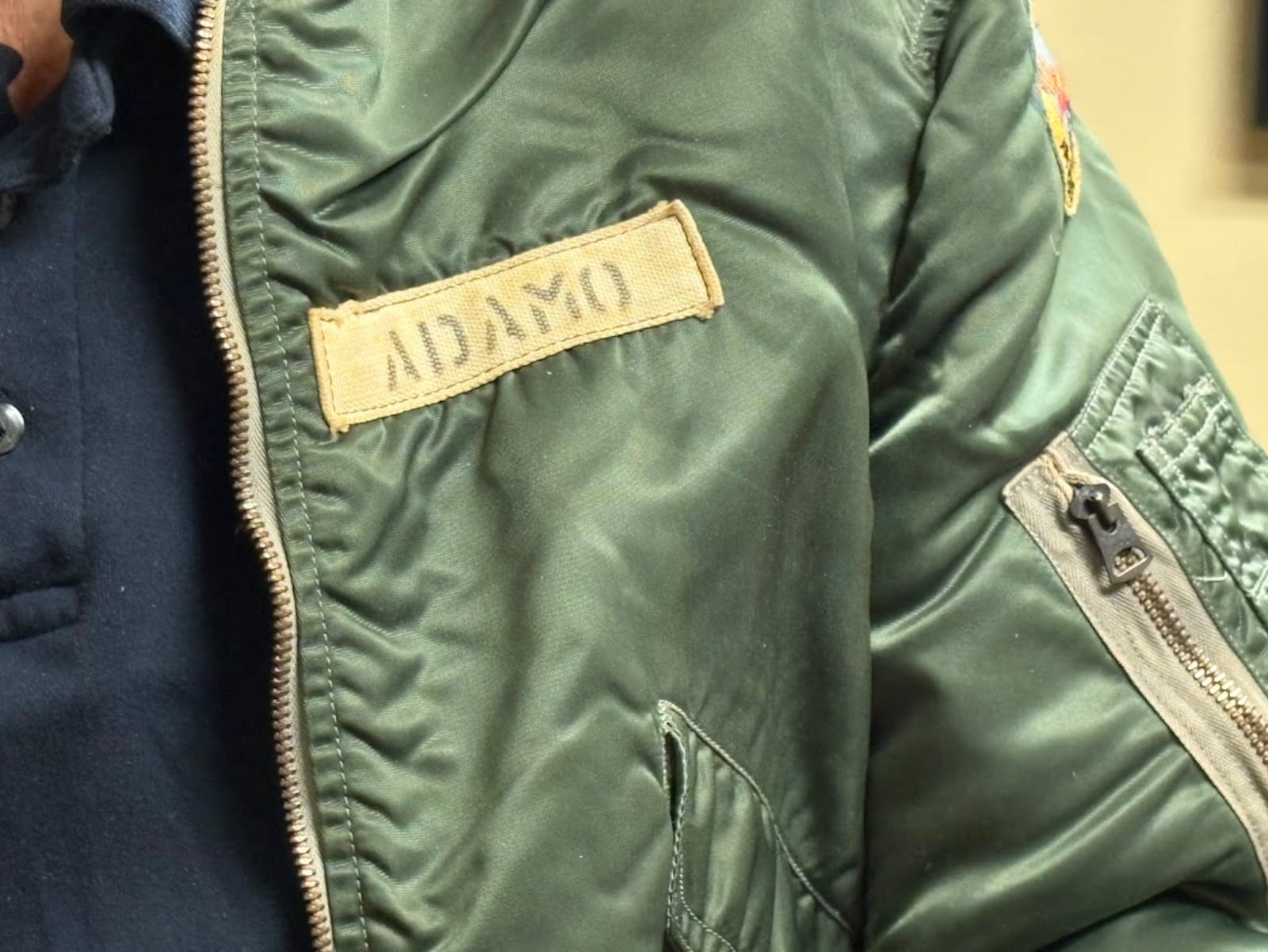 The nametag on Joseph Adamo's flight jacket. THOMAS GNAU/STAFF