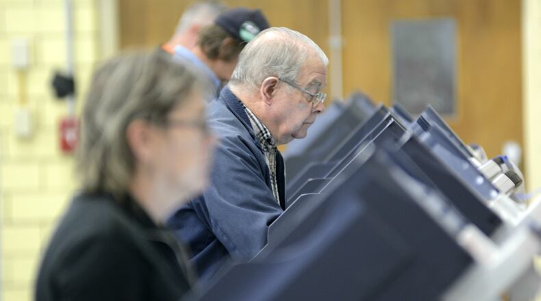 Sandusky City Commission voted last month to give its city employees Election Day in November as a paid day off so they can vote in exchange for Columbus Day. Some on Cincinnati City Council want to discuss doing the same thing. Many Butler County officials aren’t too keen on the idea. MICHAEL D. PITMAN/FILE