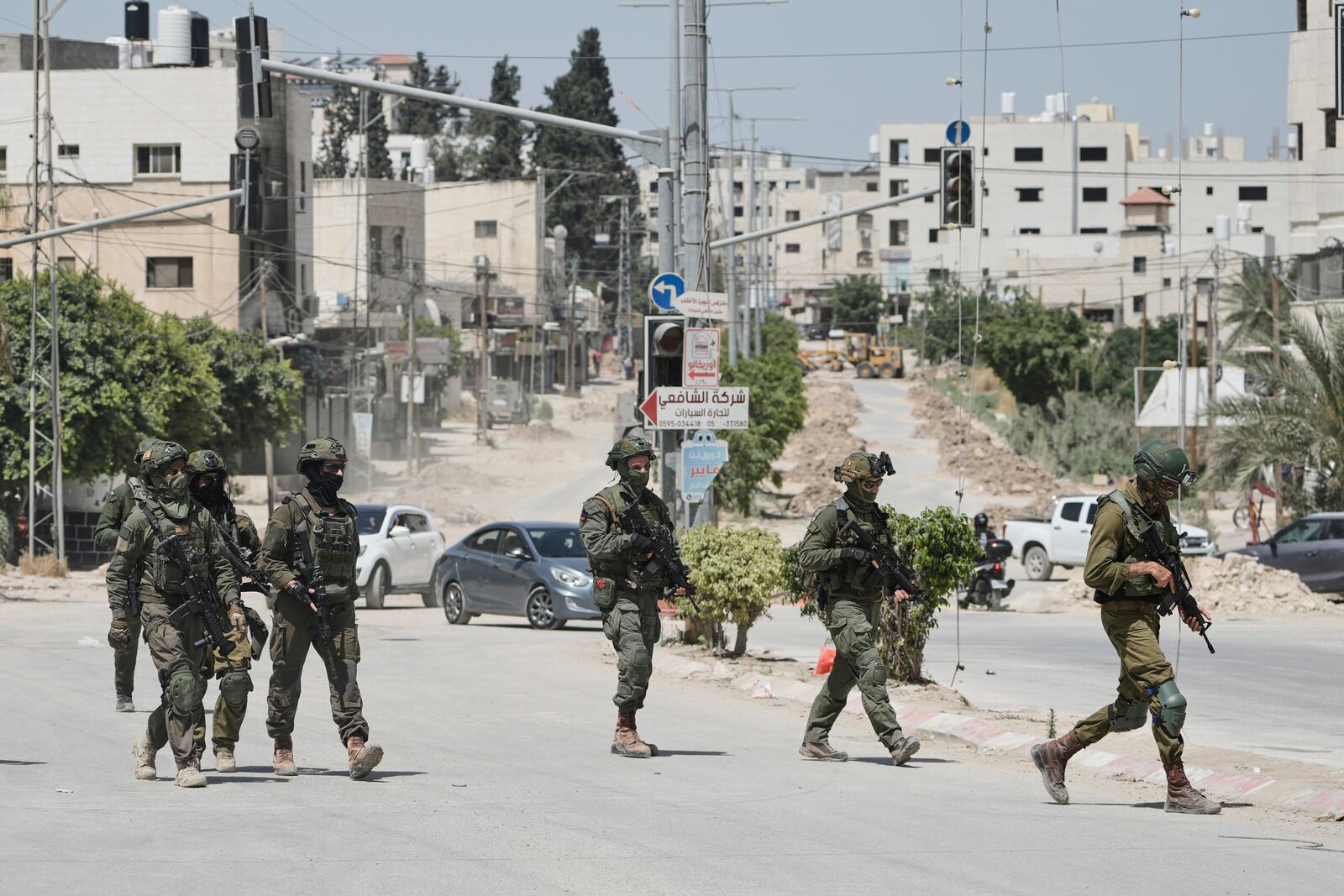 Israeli soldiers are seen during an army operation in Tulkarem, West Bank on Monday, May 26, 2025. (AP Photo/Majdi Mohammed)