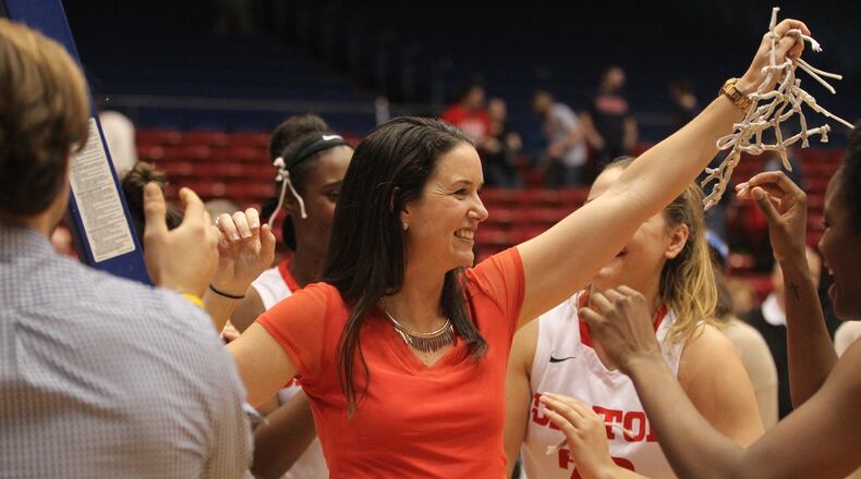 Dayton’s Shauna Green celebrates after a victory against Saint Louis on Wednesday, Feb. 22, 2017, at UD Arena.