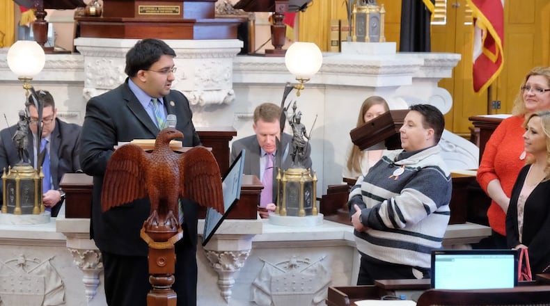 Miamisburg Christina Hole (right) was recognized Wednesday by state Rep. Niraj Antani, who presented her with a resolutions for her actions to save Las Vegas shooting victimes last year. CONTRIBUTED