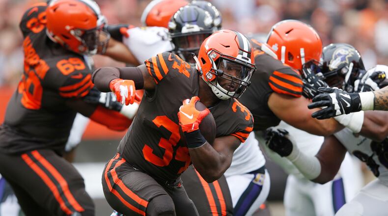CLEVELAND, OH - OCTOBER 07: Carlos Hyde #34 of the Cleveland Browns runs the ball in the first quarter against the Baltimore Ravens at FirstEnergy Stadium on October 7, 2018 in Cleveland, Ohio. (Photo by Joe Robbins/Getty Images)