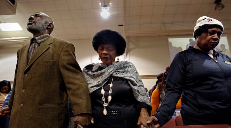 Andrew Jackson, left, Brenda Jackson, center, attended President Barack Obama's first inauguration.  (Carolyn Cole/Los Angeles Times/TNS)