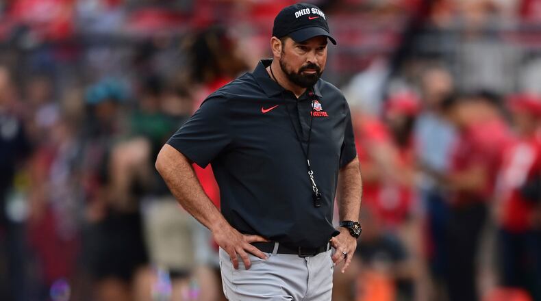 FILE - Ohio State head coach Ryan Day walks before an NCAA college football game against Notre Dame, Saturday, Sept. 3, 2022, in Columbus, Ohio. Day says the Buckeyes had a productive week of practice last week and realize the opportunity they have in front of them with a Peach Bowl showdown against top-ranked Georgia.(AP Photo/David Dermer, File)