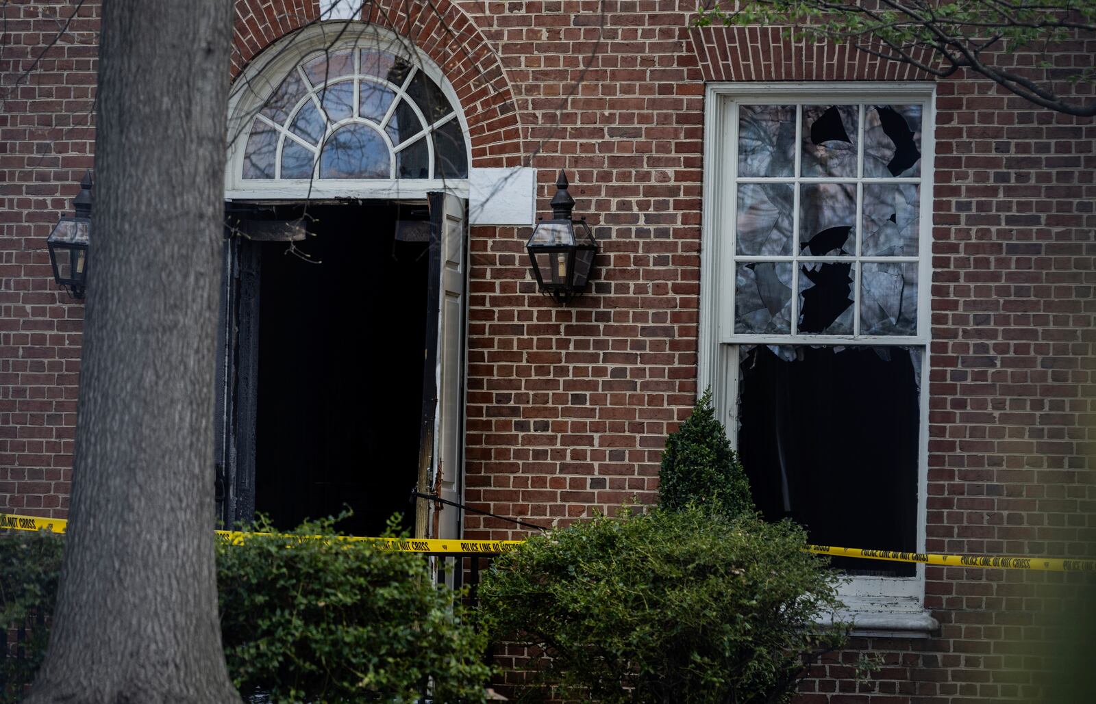 Police investigate Gov. Josh Shapiro's residence after someone set fire to the building on Sunday, April 13, 2025 in Harrisburg, Pa. (Sean Simmers/The Patriot-News via AP)