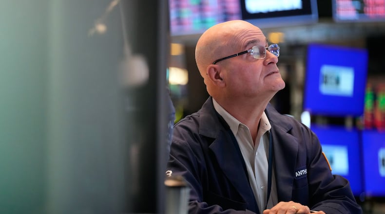 Anthony Confusione works on the floor at the New York Stock Exchange in New York, Tuesday, March 3, 2026. (AP Photo/Seth Wenig)