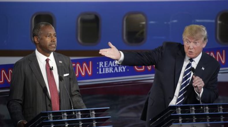 Donald Trump, right, and Ben Carson during the CNN GOP debate.
