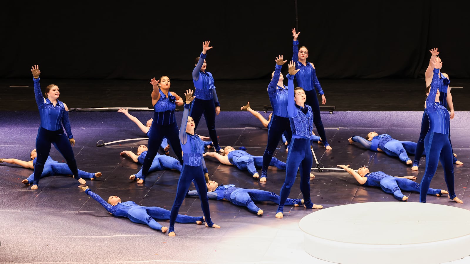 Members of Bellbrook High School's color guard perform during the Winter Guard International's World Championships Scholastic Semifinals on Friday morning, April 4, at University of Dayton Arena. BRYANT BILLING/STAFF