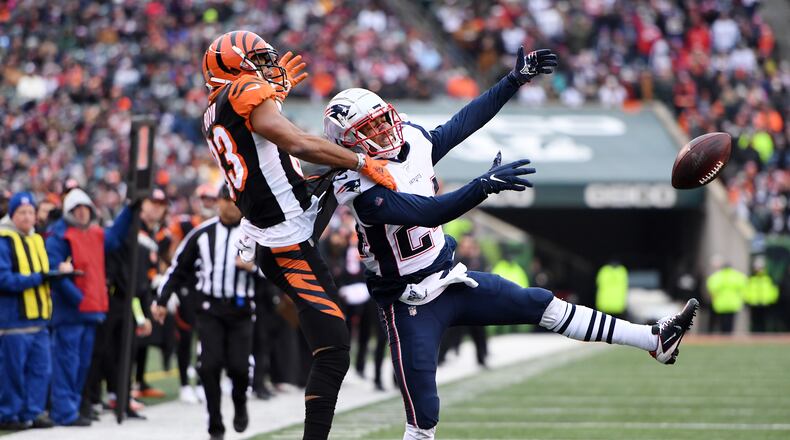 CINCINNATI, OHIO - DECEMBER 15: Stephon Gilmore #24 of the New England Patriots breaks up a pass intended for Tyler Boyd #83 of the Cincinnati Bengals during the second half in the game at Paul Brown Stadium on December 15, 2019 in Cincinnati, Ohio. (Photo by Bobby Ellis/Getty Images)