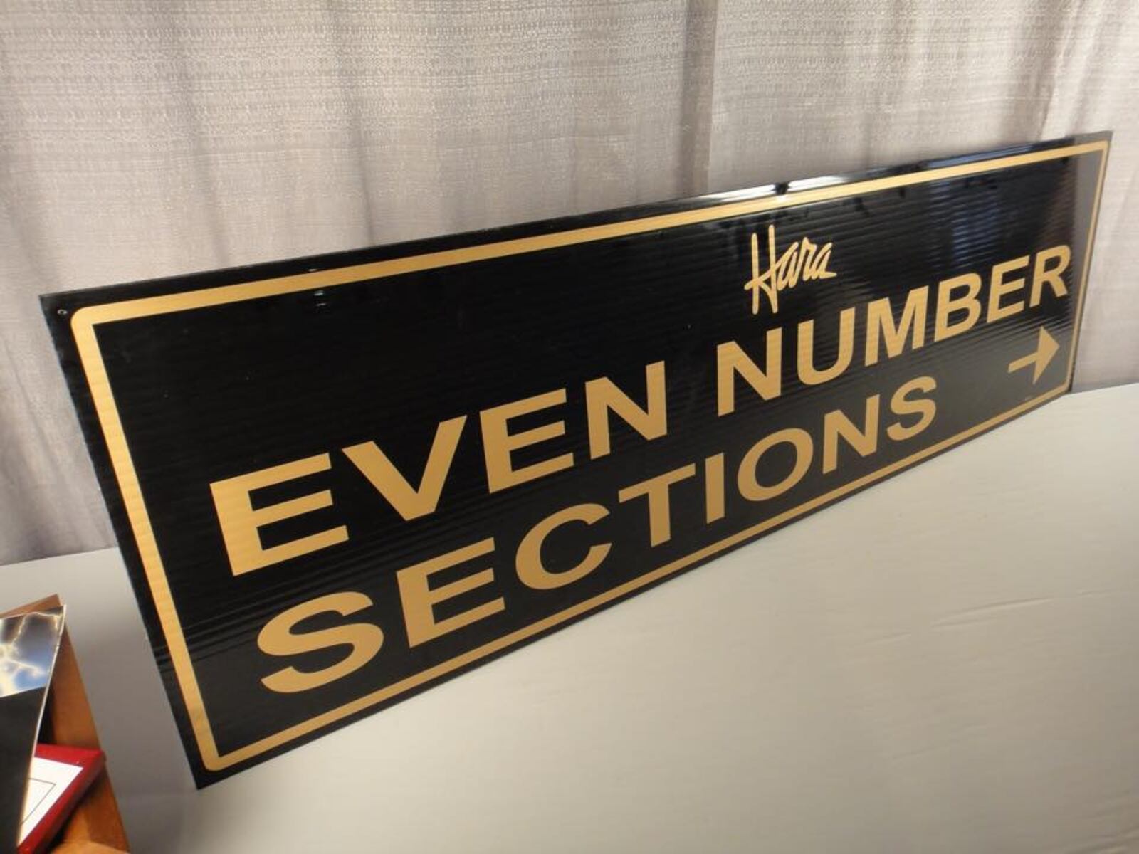 Steve and Kristy Poe, residents of Florida, bought a 5-foot sign from the Hara Auction. She received an email that it had been stolen from the auction site. CONTRIBUTED