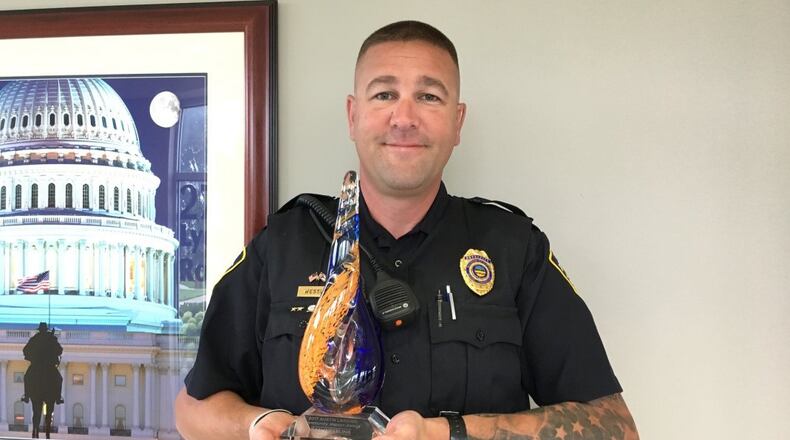 Miami Twp. Detective Dan Wessling, winner of the Community Impact Award. CONTRIBUTED