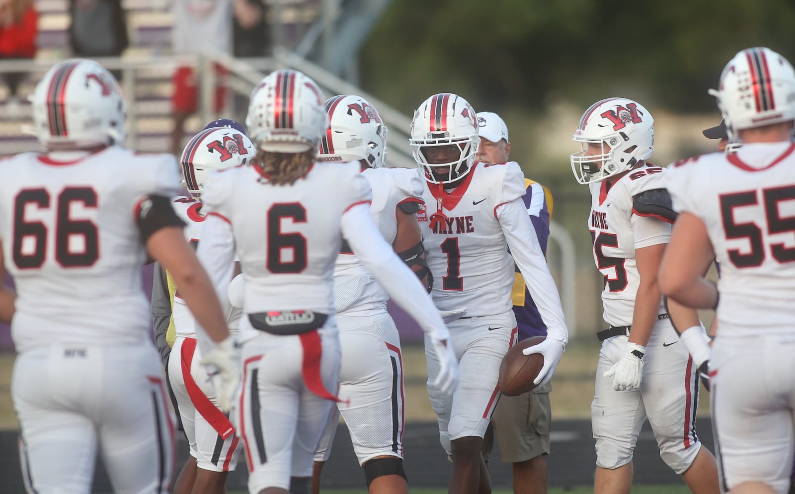 Wayne celebrates a touchdown by Jamier Averette-Brown (1) in the first quarter against Pickerington Central on Friday, Aug. 29, 2025, in Pickerington. David Jablonski/Staff