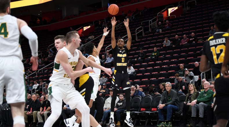 Jalen Tate (11 in black) was among the hot shooters for the Norse on Tuesday night.