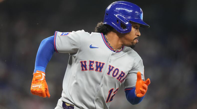 FILE - New York Mets' Francisco Lindor runs after hitting a double during the seventh inning of a baseball game against the Miami Marlins, Sept. 28, 2025, in Miami. (AP Photo/Lynne Sladky, File)