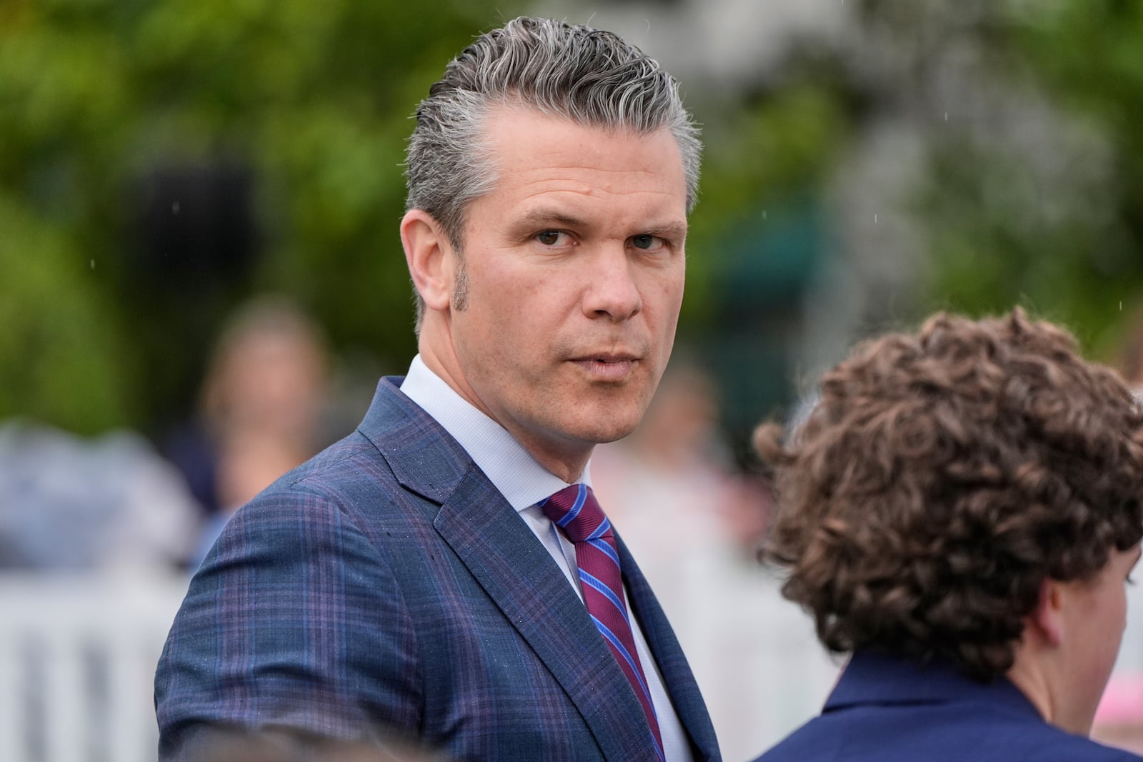 Defense Secretary Pete Hegseth arrives on the South Lawn of the White House before President Donald Trump and first lady Melania Trump participate in the White House Easter Egg Roll Monday, April 21, 2025, in Washington. (AP Photo/Alex Brandon)