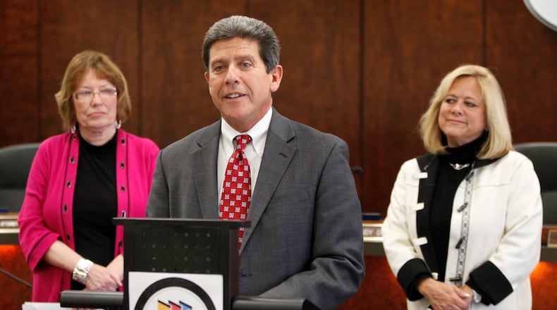 Joe Tuss (center) was appointed as Montgomery County Administrator in 2012. At left is Montgomery County Commissioner Judy Dodge and at right is Montgomery County Commissioner Debbie Lieberman. STAFF PHOTO BY LISA POWELL