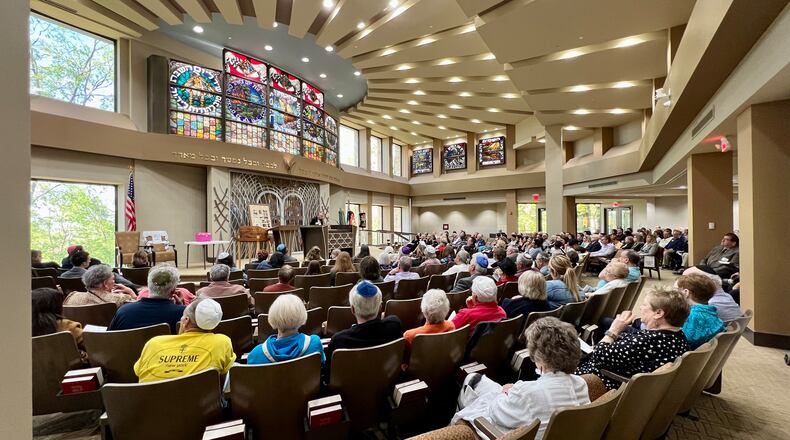 More than 100 people gathered at the Beth Abraham Synagogue on Sunday for the annual Yom Hashoah Observance, this year marking the 80th anniversary of the liberation of Dachau concentration camp on April 29, 1945. AIMEE HANCOCK/STAFF