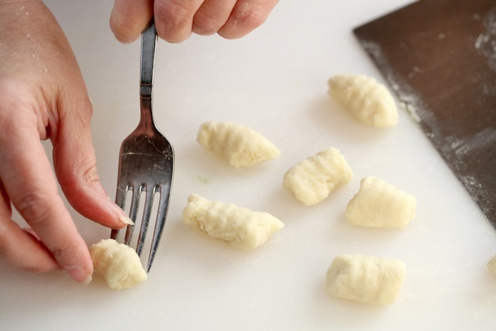 Making lines in the dough with a fork for gnocchi on Tuesday, Dec. 15, 2015. Styled by Lisa Schumacher. (Michael Tercha/Chicago Tribune/TNS)