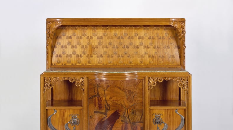 Art Nouveau furniture is on display at the Dayton Art Institute. This is a Louis Majorelle, Buffet, about 1900, fruitwood and marble, 65 × 67 × 221/4 in., Gift of Walter P. Chrysler, Jr. CONTRIBUTED/CHRYSLER MUSEUM OF ART