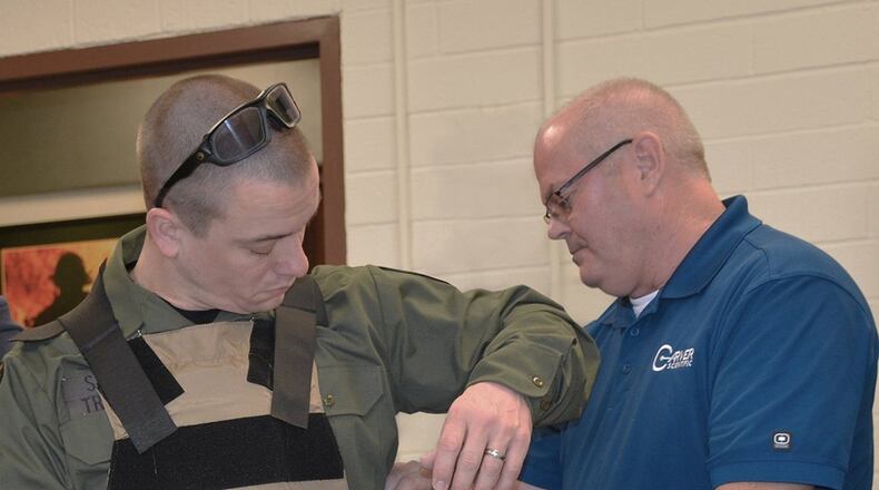 Carver Scientific outfits Ohio State Highway Patrol personnel with its microclimate cooling technology to test and evaluate during a training exercise at the recent Tech Warrior OPS event. (Air Force photo)