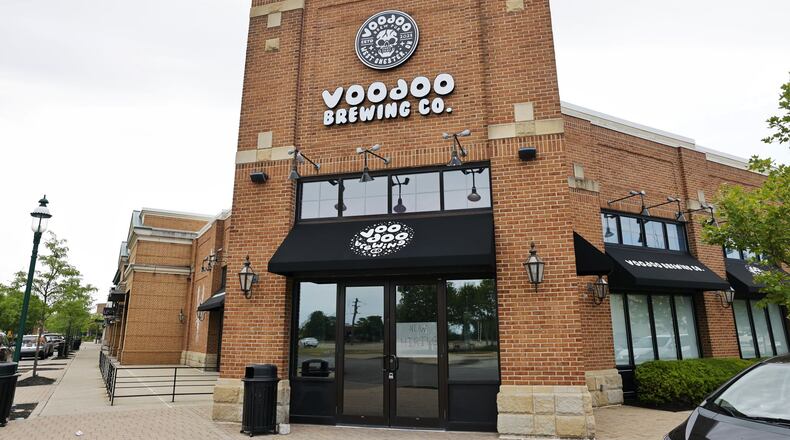 Voodoo Brew Pub is opening at Streets of West Chester in the former Mitchell's Fish Market location. NICK GRAHAM/STAFF