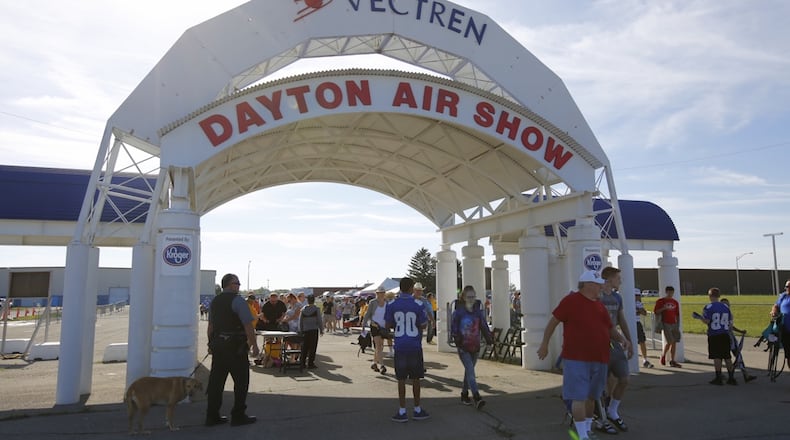 Airshow fans enter the gate early at the Vectren Dayton Air Show on a Saturday morning in 2017. TY GREENLEES / STAFF
