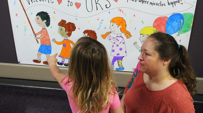 Jannet Pikos drops off her daughter Mycah, 3, at preschool class at United Rehabilitation Services, 4710 Troy Pike in Montgomery County on Tuesday April 4, 2023. MARSHALL GORBY\STAFF