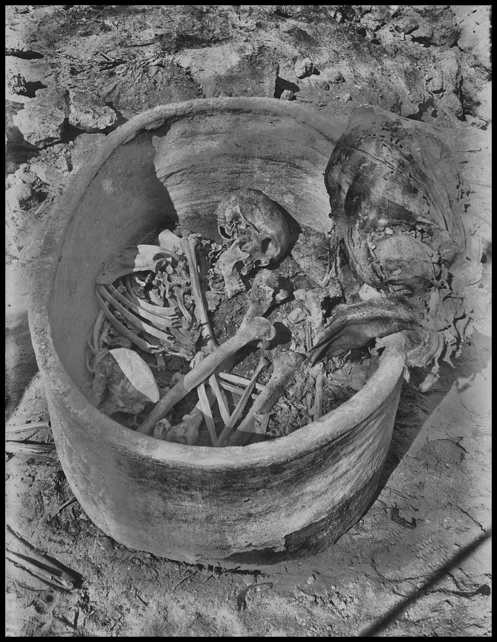 This photo provided by researchers shows a pottery vessel containing the remains of a man, radiocarbon dated to around 2855–2570 cal BCE, in Nuwayrat, Egypt. (Mahmoud Abd El Gelel/Garstang Museum of Archaeology/University of Liverpool via AP)