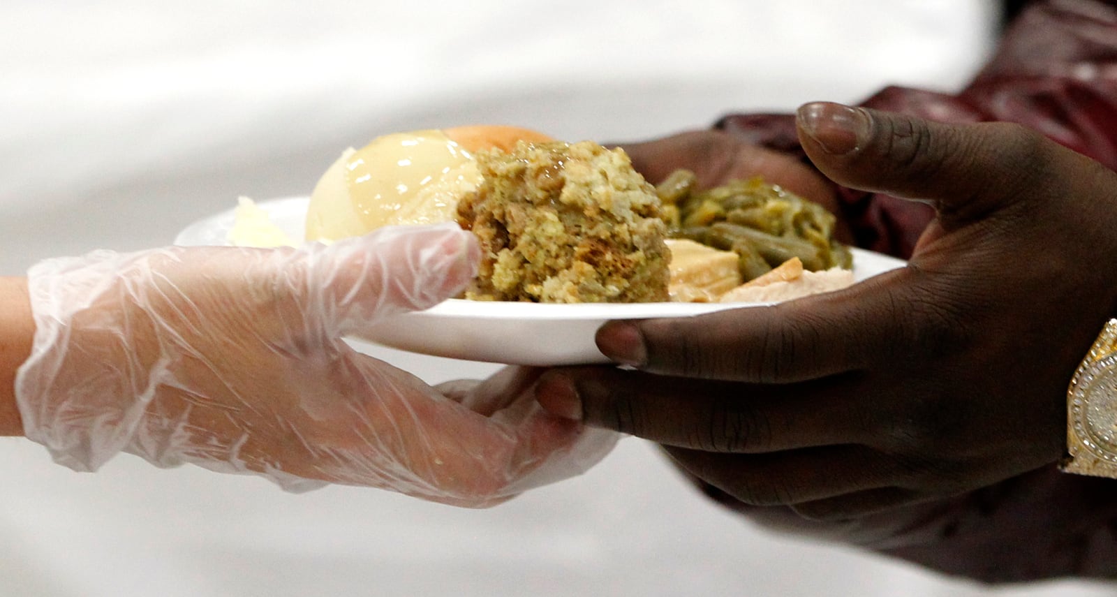 The Feast of Giving will be held Thanksgiving Day at the Dayton Convention Center. Volunteers will dish out free dinners for thousands expected to attend. STAFF