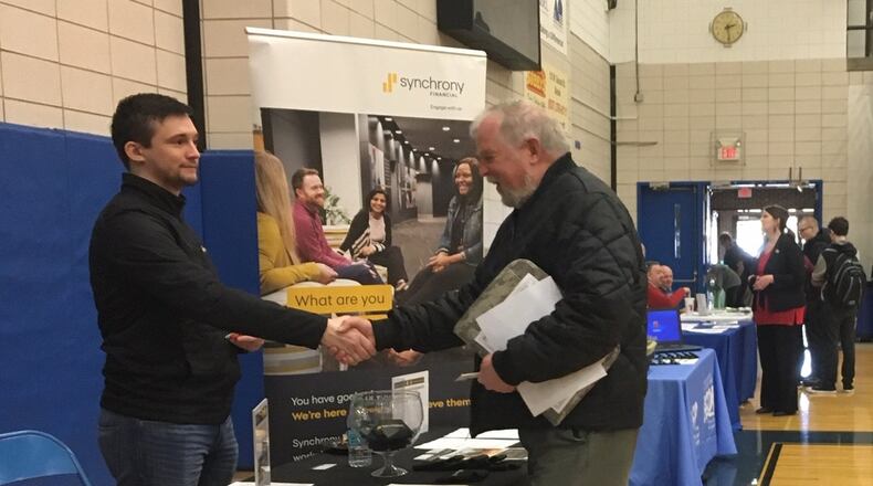 More than 60 employers were looking for new workers Wednesday, March 13, 2019 at the Xenia Job Fair, which was held in the gymnasium at Xenia High School, 303 Kinsey Road. RICHARD WILSON/STAFF