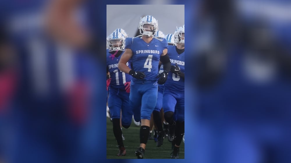 Springboro senior Evan Weinberg run onto the field before a game against Fairmont on Friday, Oct. 10, 2025, at CareFlight Field in Springboro. David Jablonski/Staff