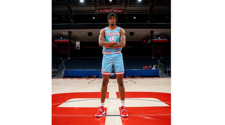 Dayton's DaRon Holmes II models the Marianist Blue uniform the team will wear on Friday, Nov. 11, 2022, during a game against SMU. Photo courtesy of UD