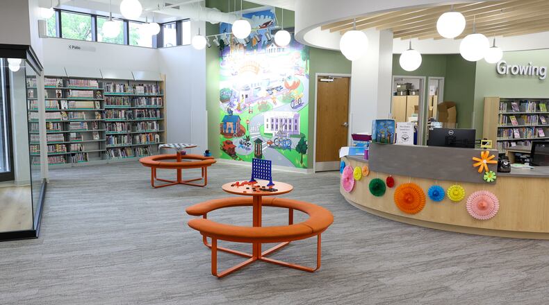 The Xenia Community Library reopened to the public in May, following an extensive, multi-year renovation. An expanded children's area, additional windows with natural light, glass walls and low bookshelves are among the changes. BRYANT BILLING / STAFF