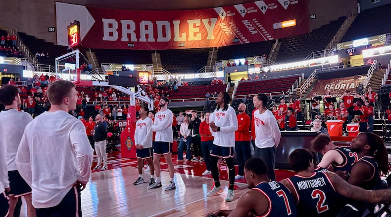 Dayton's Amaël L'Etang draws a foul in the first half against Bradley in the first round of the National Invitation Championship on Wednesday, March 18, 2026, at Carver Arena in Peoria, Ill. David Jablonski/Staff