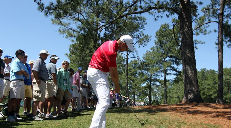 April 8, 2012 AUGUSTA—Henrik Stenson shoots from the #1 fairway to short of the green Sunday afternoon. Shots from the 2012 Masters final round Easter Sunday April 8, 2012. Curtis Compton ccompton@ajc.com