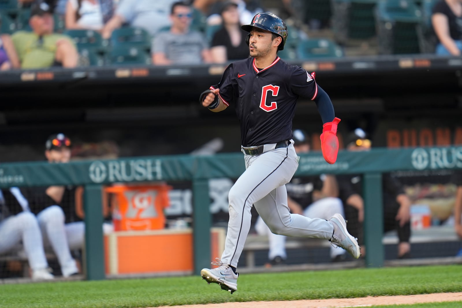 Cleveland Guardians' Steven Kwan runs to score on a single by José Ramírez during the eighth inning of a baseball game against the Chicago White Sox, Saturday, July 12, 2025, in Chicago. (AP Photo/Erin Hooley)