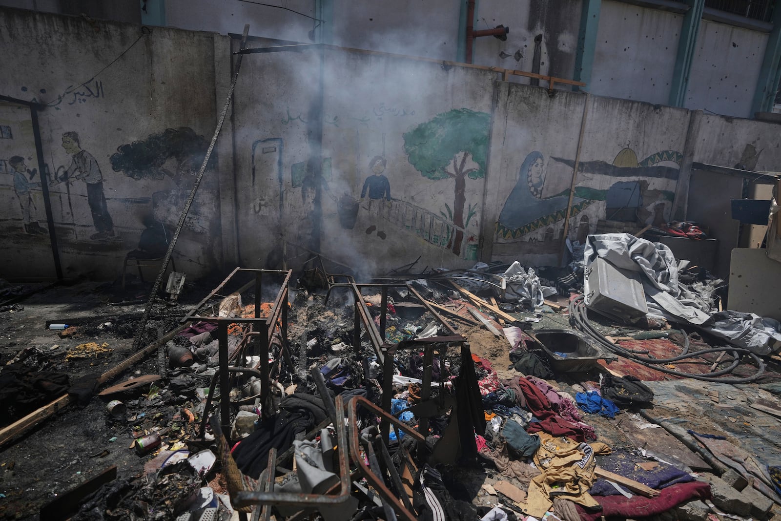The destruction of a school used as a shelter after it was struck by an Israeli airstrike in Gaza City, on Thursday, July 3, 2025. (AP Photo/Jehad Alshrafi)