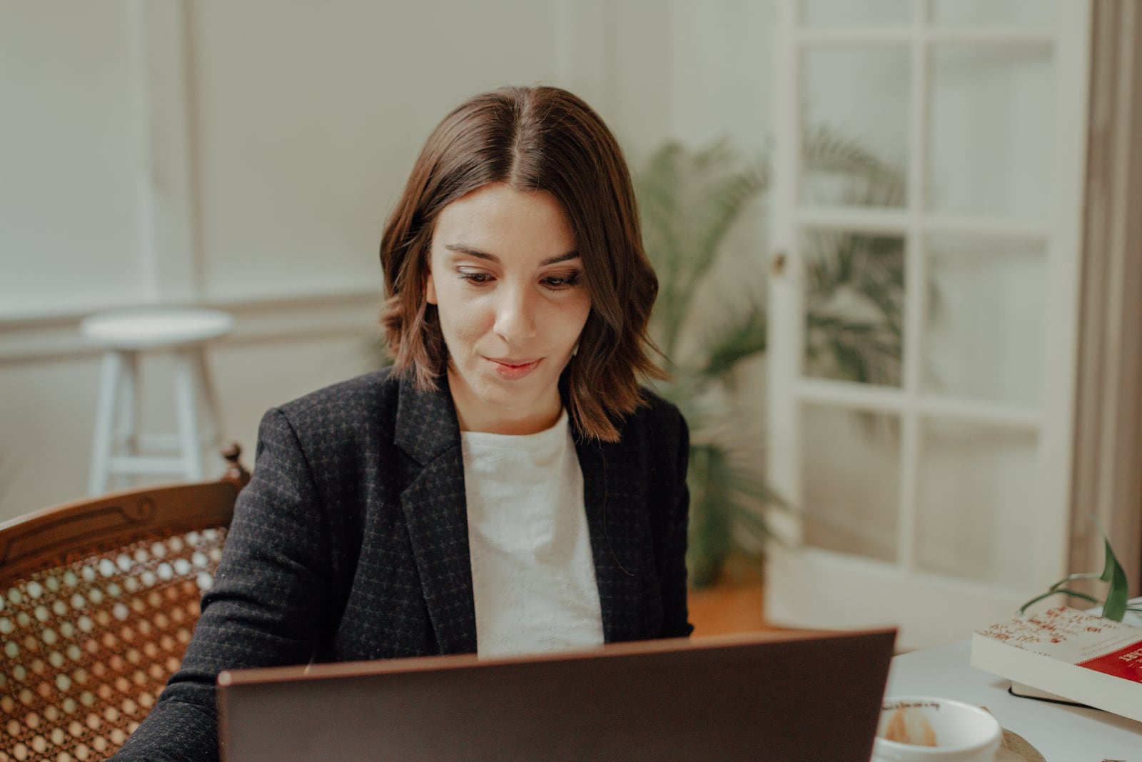 Emily Scovil opened her own marketing company last year after building a successful network through freelancing. She is shown working in 2020. CONTRIBUTED