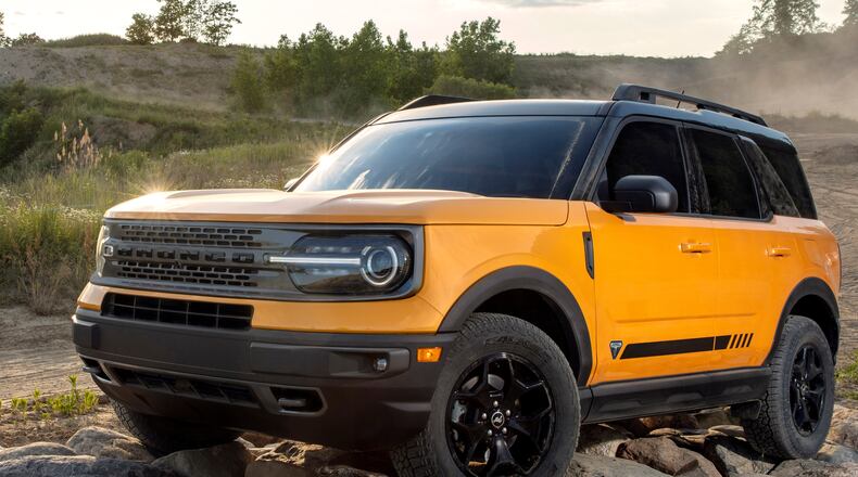 The all-new Bronco Sport First Edition series in Cyber Orange Metallic Tri-Coat. (Pre-production model pictured.)  Ford Motor Co. photo