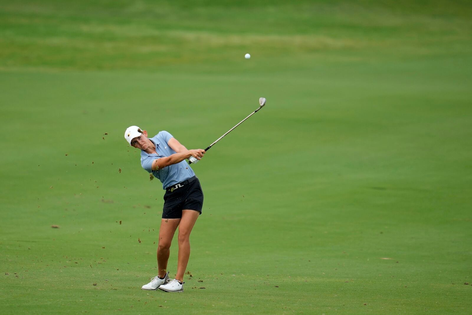 Dewi Weber, of Netherlands, hits on the 18th hole during the first round of the Chevron Championship LPGA golf tournament Thursday, April 24, 2025, in The Woodlands, Texas. (AP Photo/Ashley Landis)
