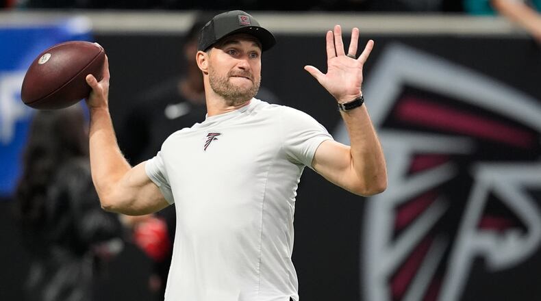 Atlanta Falcons quarterback Kirk Cousins warms up before an NFL football game against the Miami Dolphins, Sunday, Oct. 26, 2025, in Atlanta. (AP Photo/Mike Stewart)