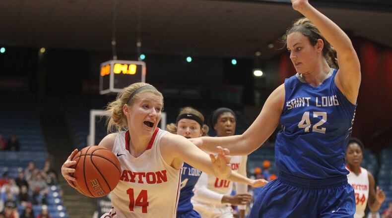 Dayton’s Jenna Burdette looks for a shot against Saint Louis on Feb. 22, 2017, at UD Arena. David Jablonski/Staff