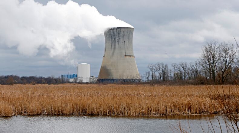FILE - The then-FirstEnergy Corp.'s Davis-Besse Nuclear Power Station in Oak Harbor, Ohio, is pictured on April 4, 2017. (AP Photo/Ron Schwane, File)