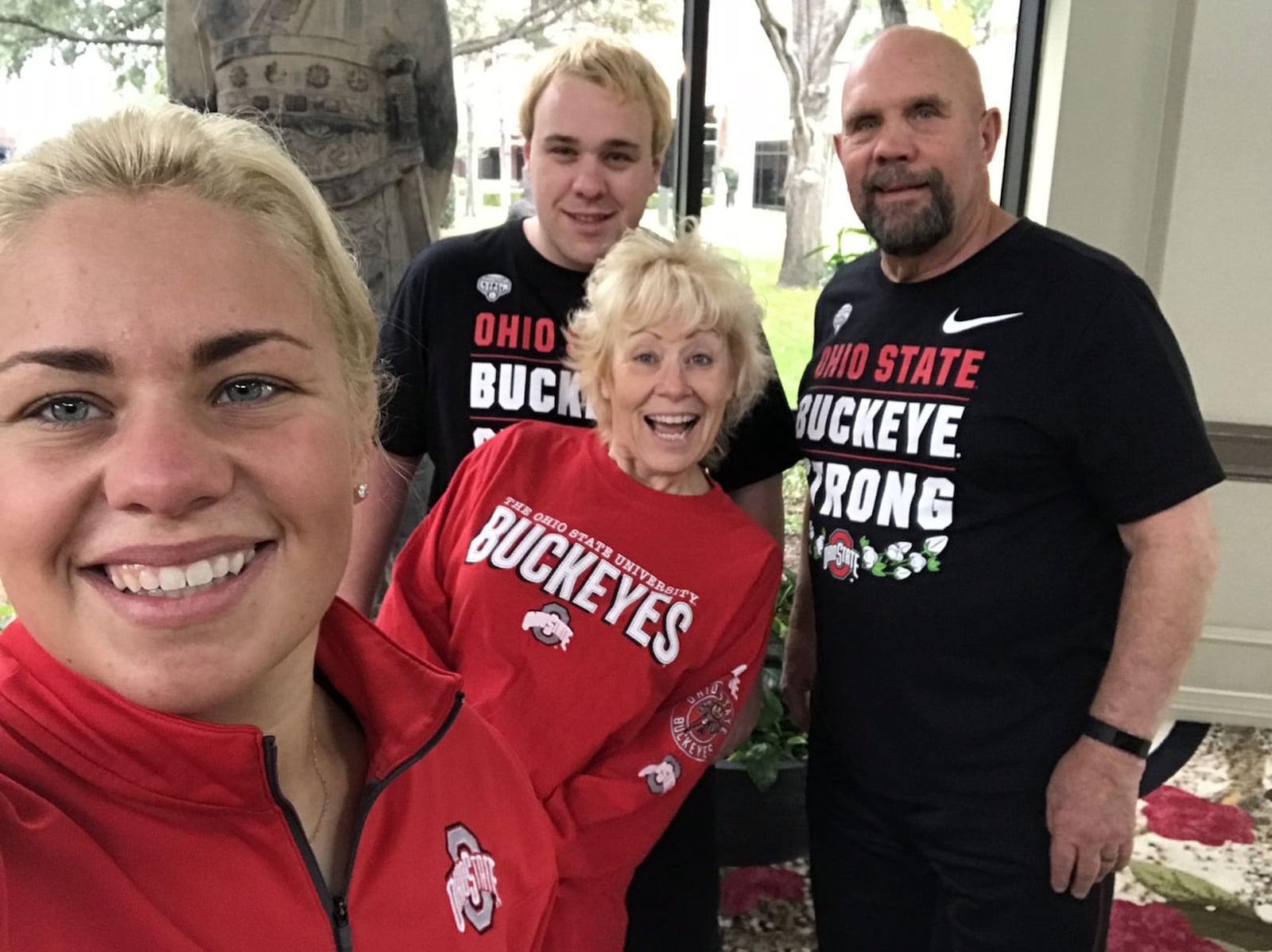 Ohio State trainer Ali Fischer with her parents — Tom and Sherrie — and brother Hunter. CONTRIBUTED
