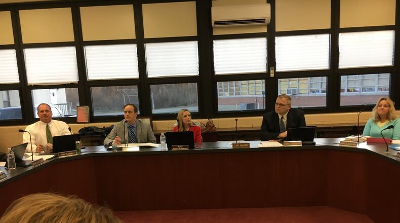 Franklin school board members hear a concern from a parent about what the district is doing to prevent incidents such as the recent event at a Florida high school. The board heard a report on safety and security measures the district has taken over the past several years during its meeting Monday, Feb. 26, 2018. ED RICHTER/STAFF